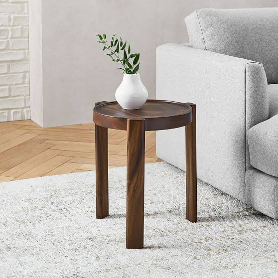Stabelbart rundt sidebord i massivt træ